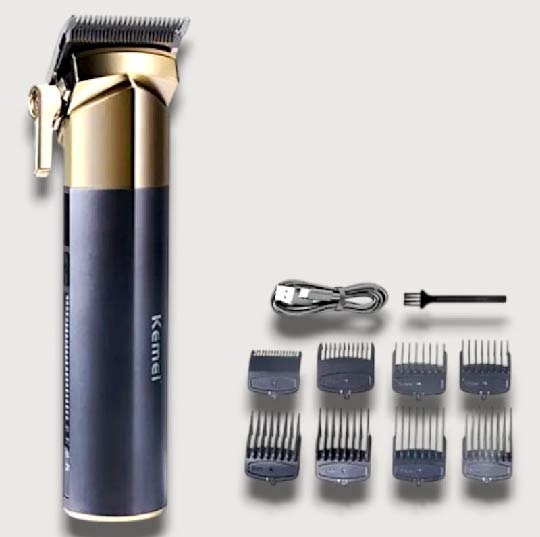 MAQUINA CORTADORA PARA CABELLO KEMEI NEGRA CON DORADO X6UNDS- OMC-483