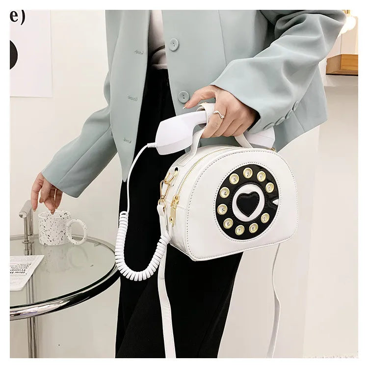 BOLSO EN FORMA DE TELEFONO CON BOCINA DECORATIVA  x6UNDS - POC-730