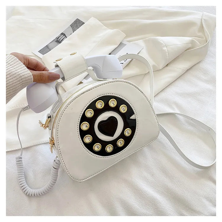 BOLSO EN FORMA DE TELEFONO CON BOCINA DECORATIVA  x6UNDS - POC-730